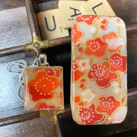 A Scrabble Tile Pendant and Teeny Tiny Tin Poppy