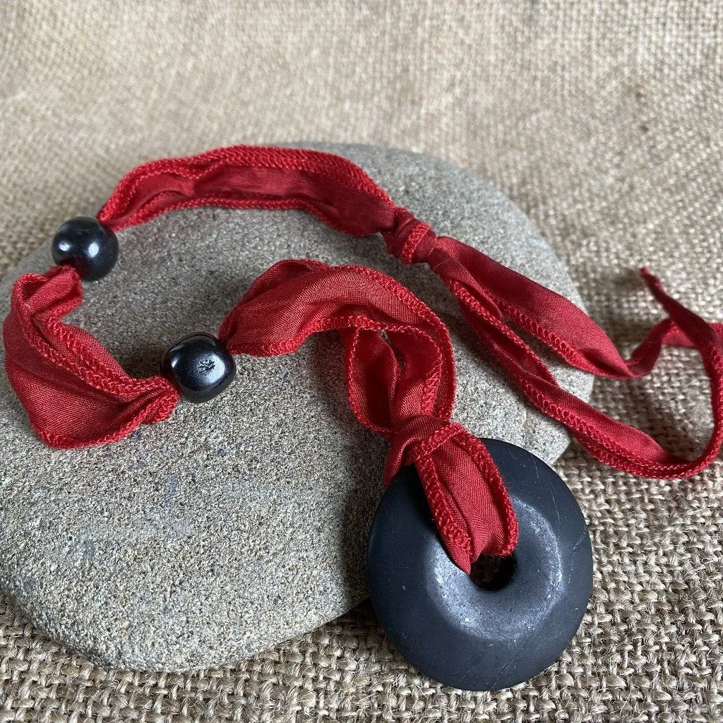 Hangable Shungite Donut Accessory on Hand-Dyed Red Silk