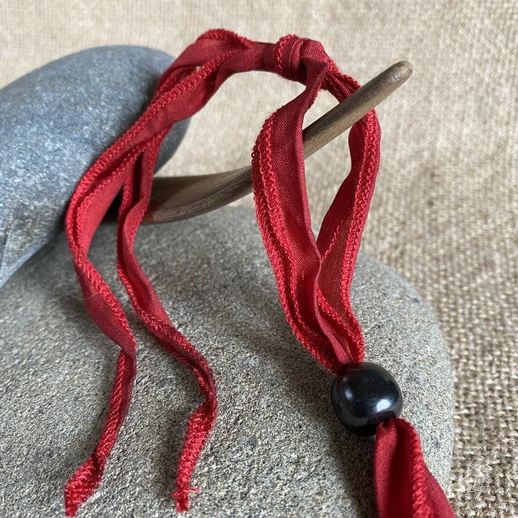 Hangable Shungite Donut Accessory on Hand-Dyed Red Silk